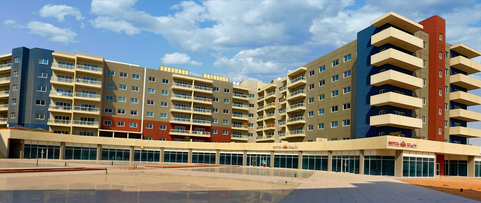 Modern exterior of Al Reef Downtown buildings, Al Reef, Abu Dhabi, completed 2013.